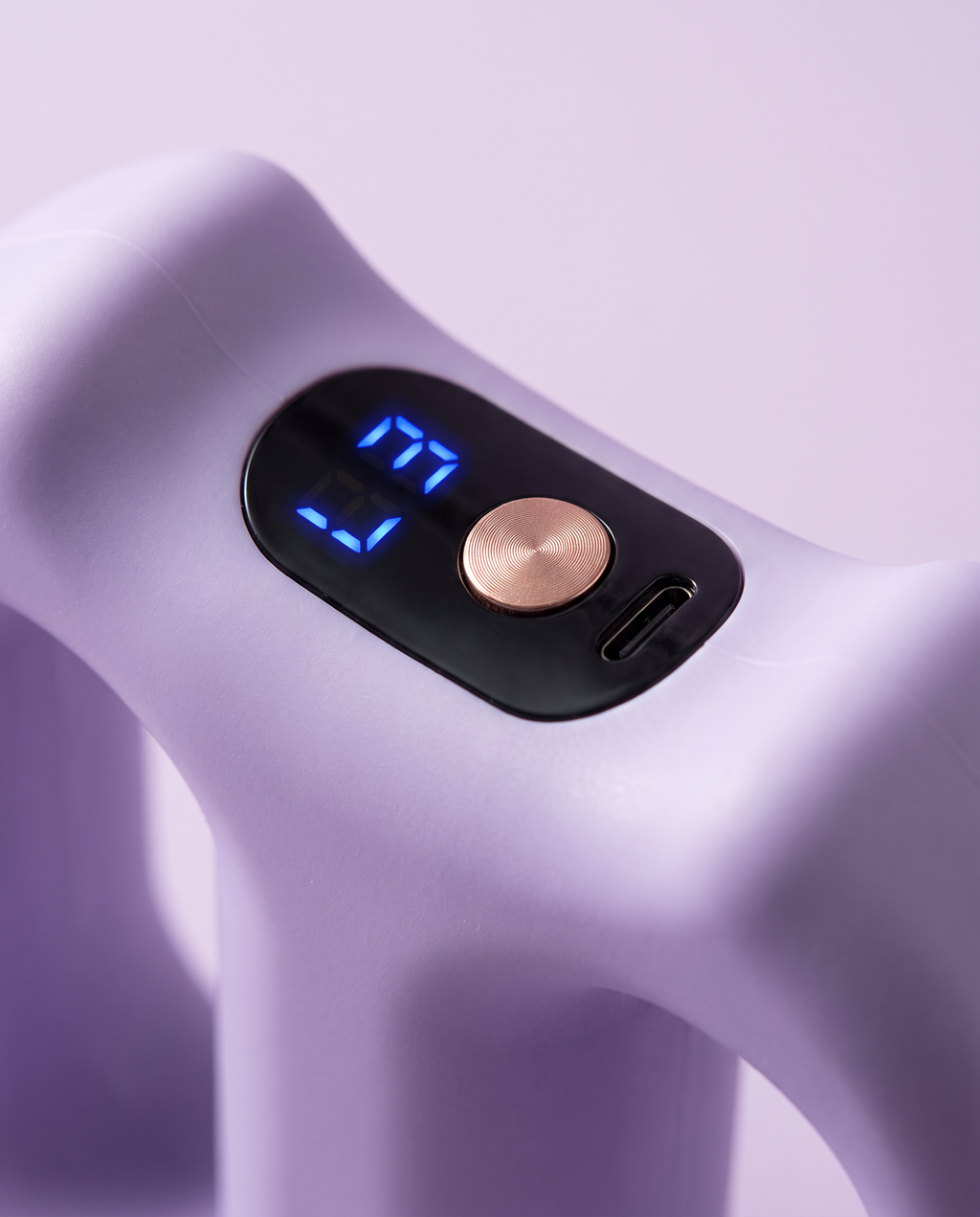Close-up of the LED display, button and USB-C port