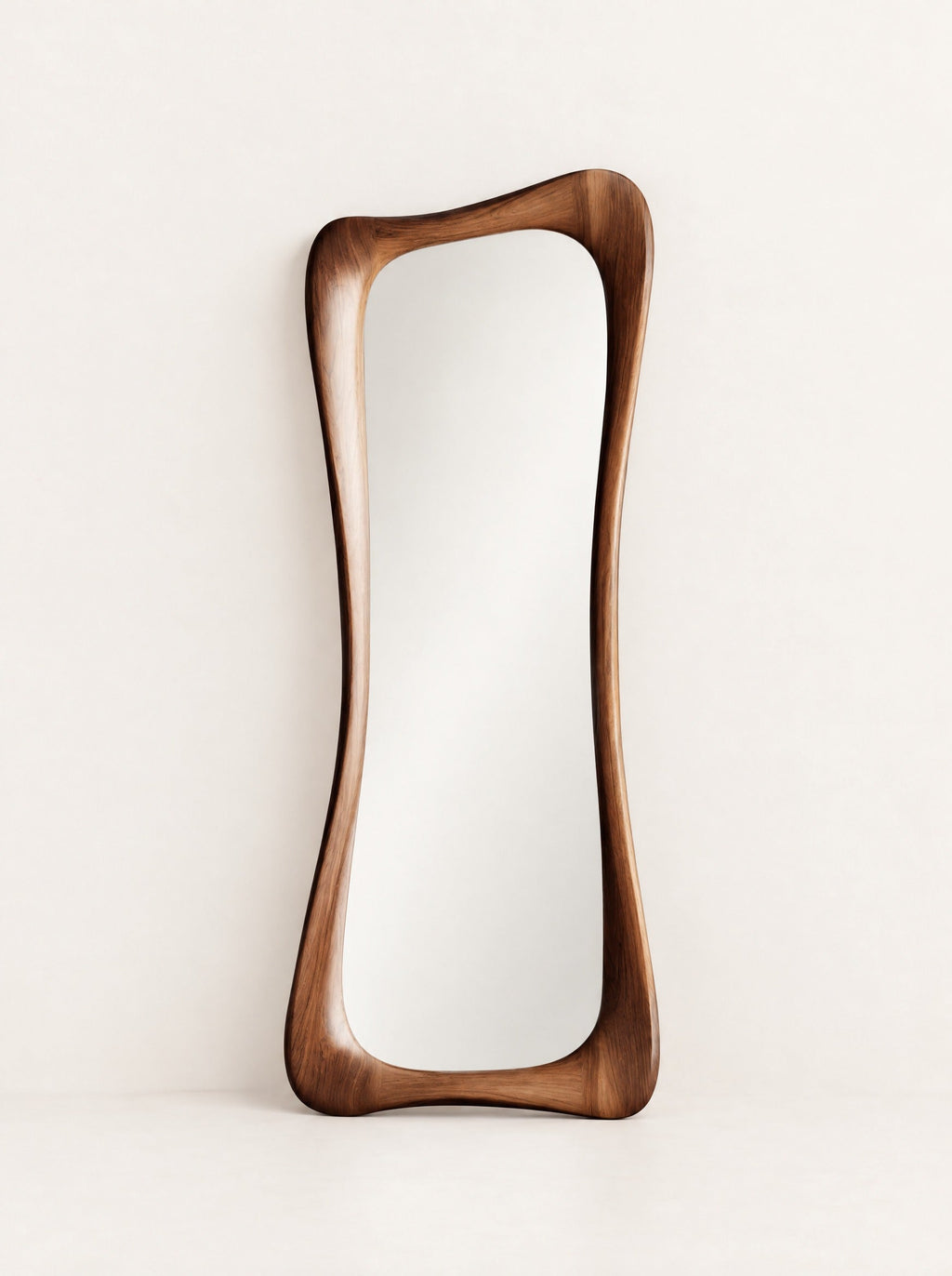 Atelier Sculpted Walnut Mirror, studio photo on a warm white background
