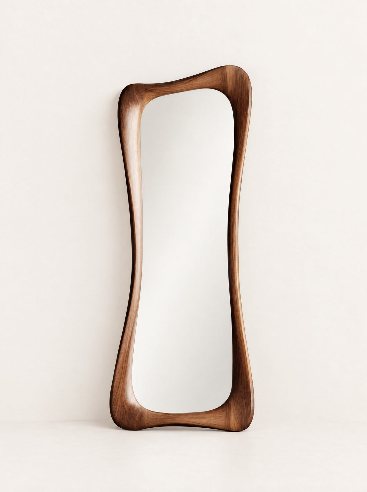 Atelier Sculpted Walnut Mirror, studio photo on a warm white background