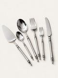 Baluster Steel Cutlery Set, studio photo on a warm white background