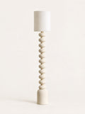 Bead Column Floor Lamp, studio photo on a warm white background