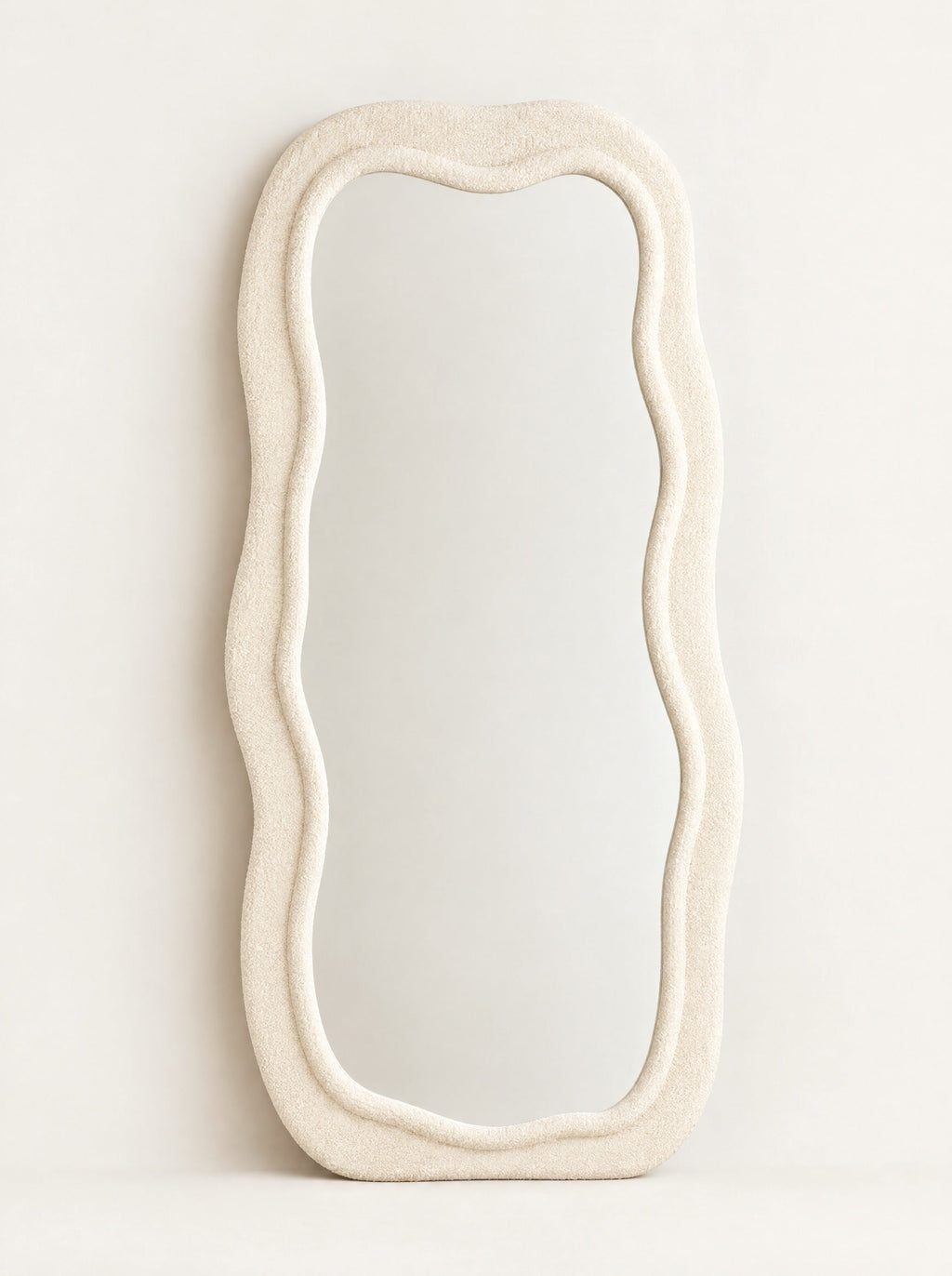 Billow Wavy Floor Mirror, studio photo on a warm white background