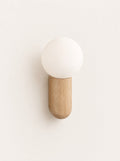 Buoy Wood & Opal Sconce, studio photo on a warm white background