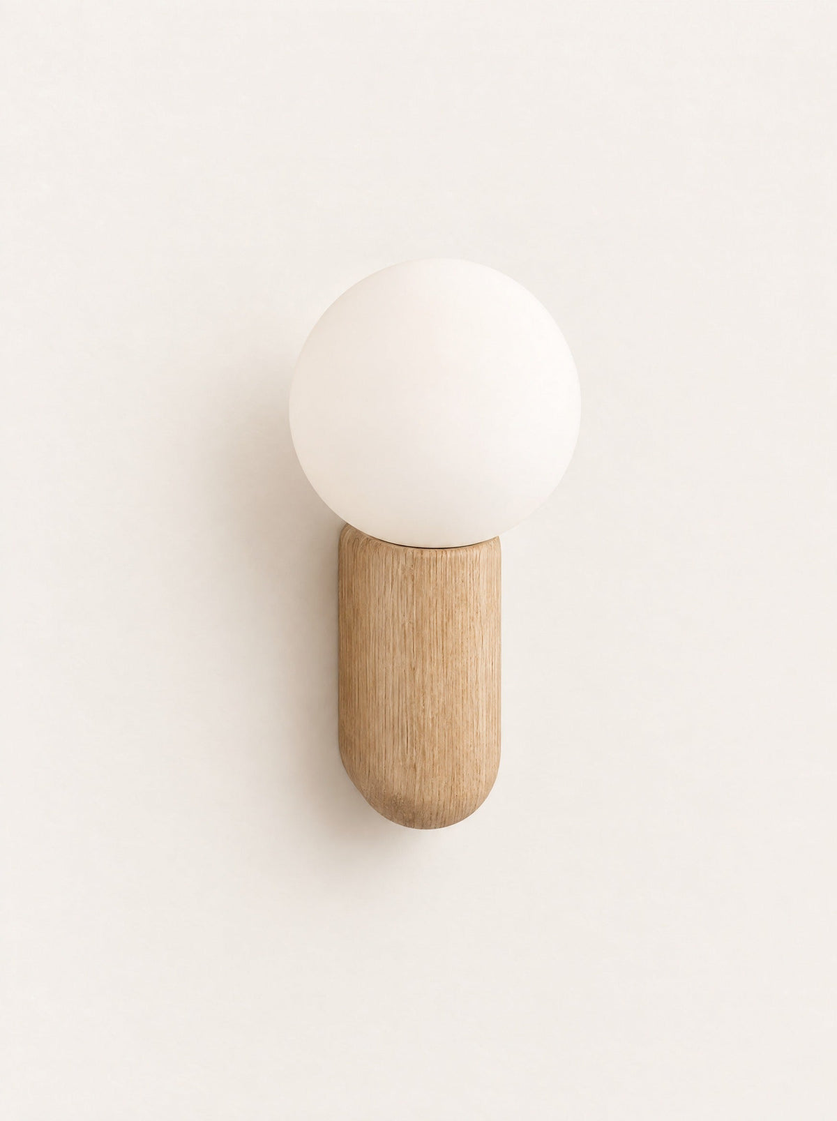 Buoy Wood & Opal Sconce, studio photo on a warm white background