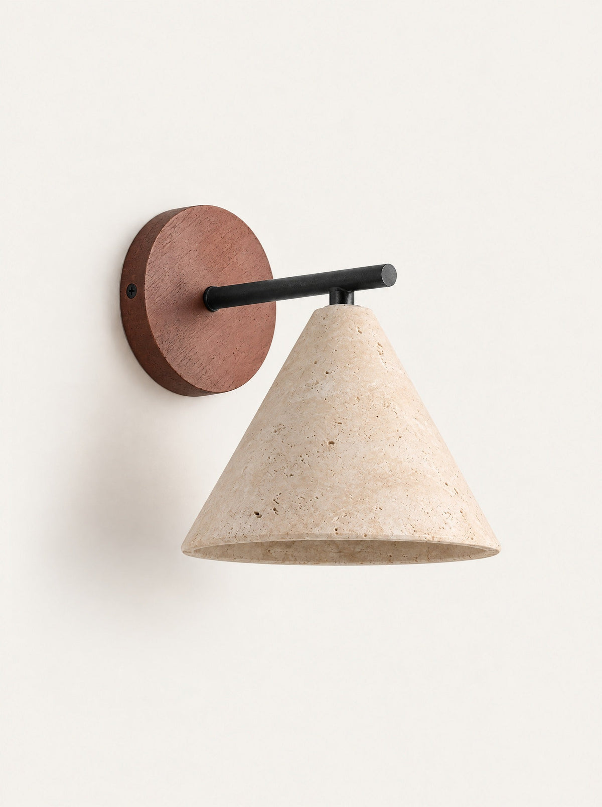 Cala Travertine Cone Sconce, studio photo on a warm white background
