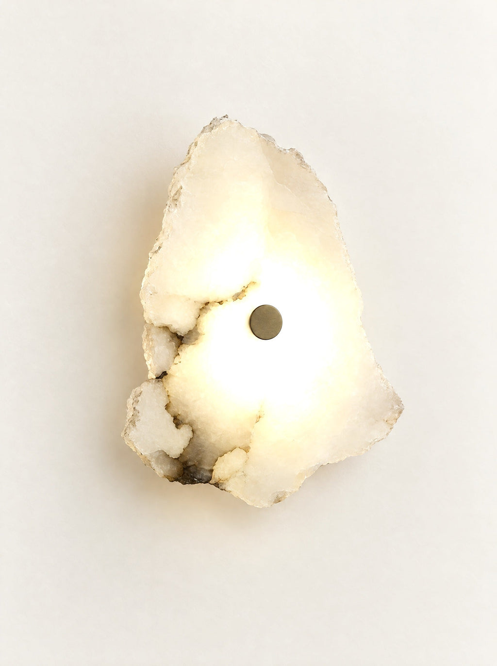 Cascade Marble Wall Light switched on, studio photo on a warm white background