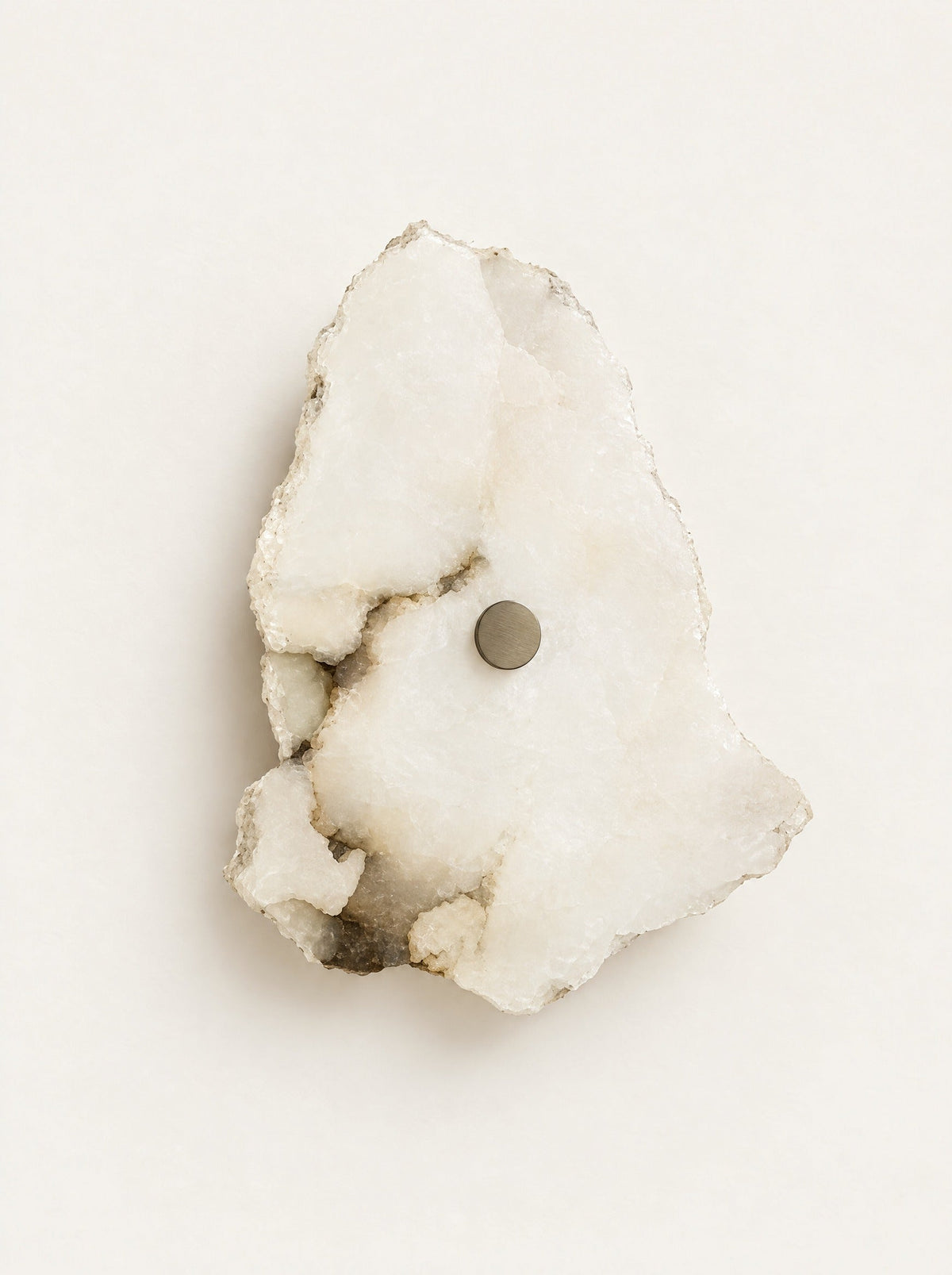 Cascade Marble Wall Light, studio photo on a warm white background