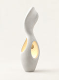 Coral Sculptural Floor Lamp, studio photo on a warm white background
