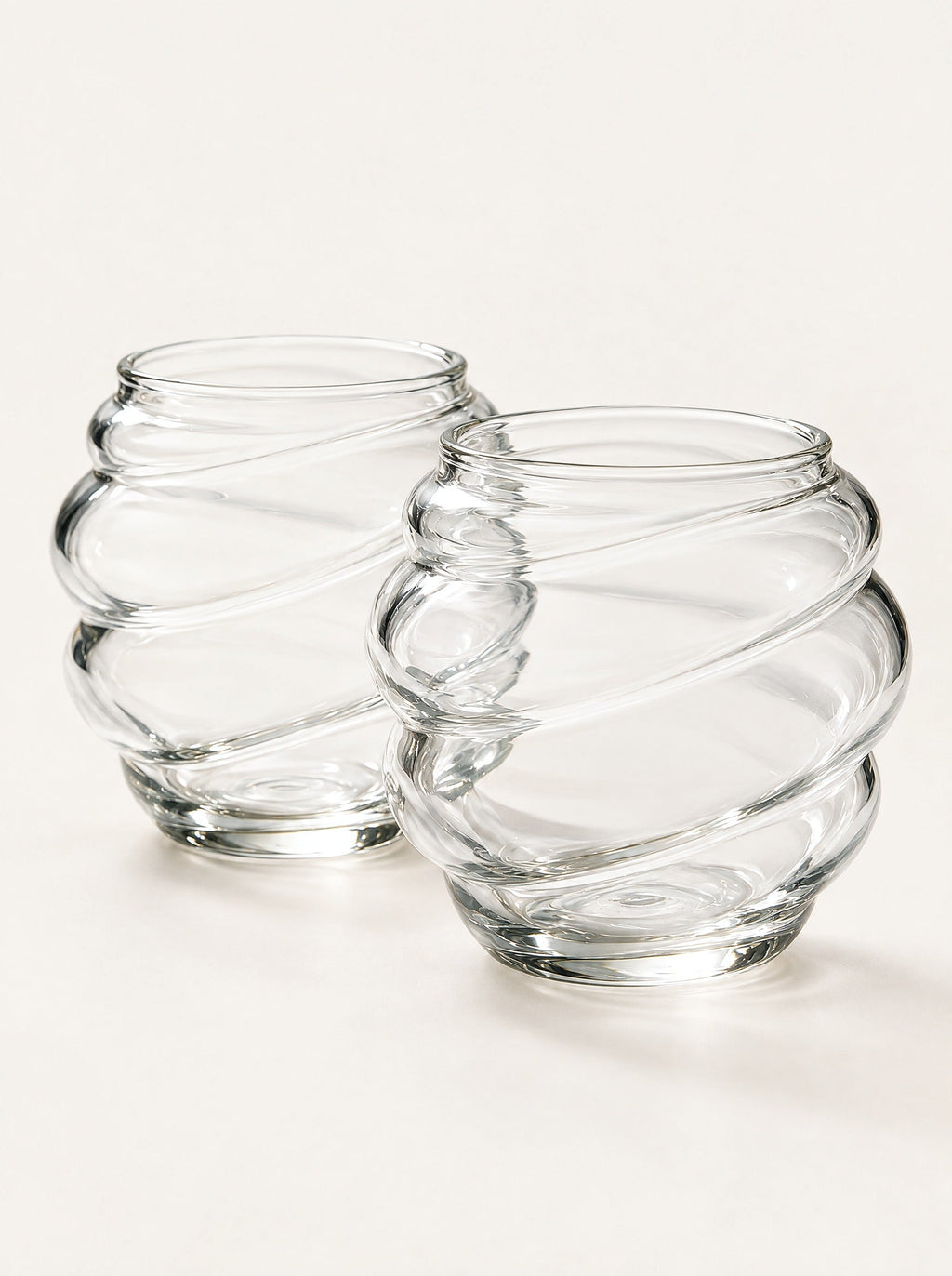 Eddy Ribbed Glass Cup, close-up studio photo on a warm white background