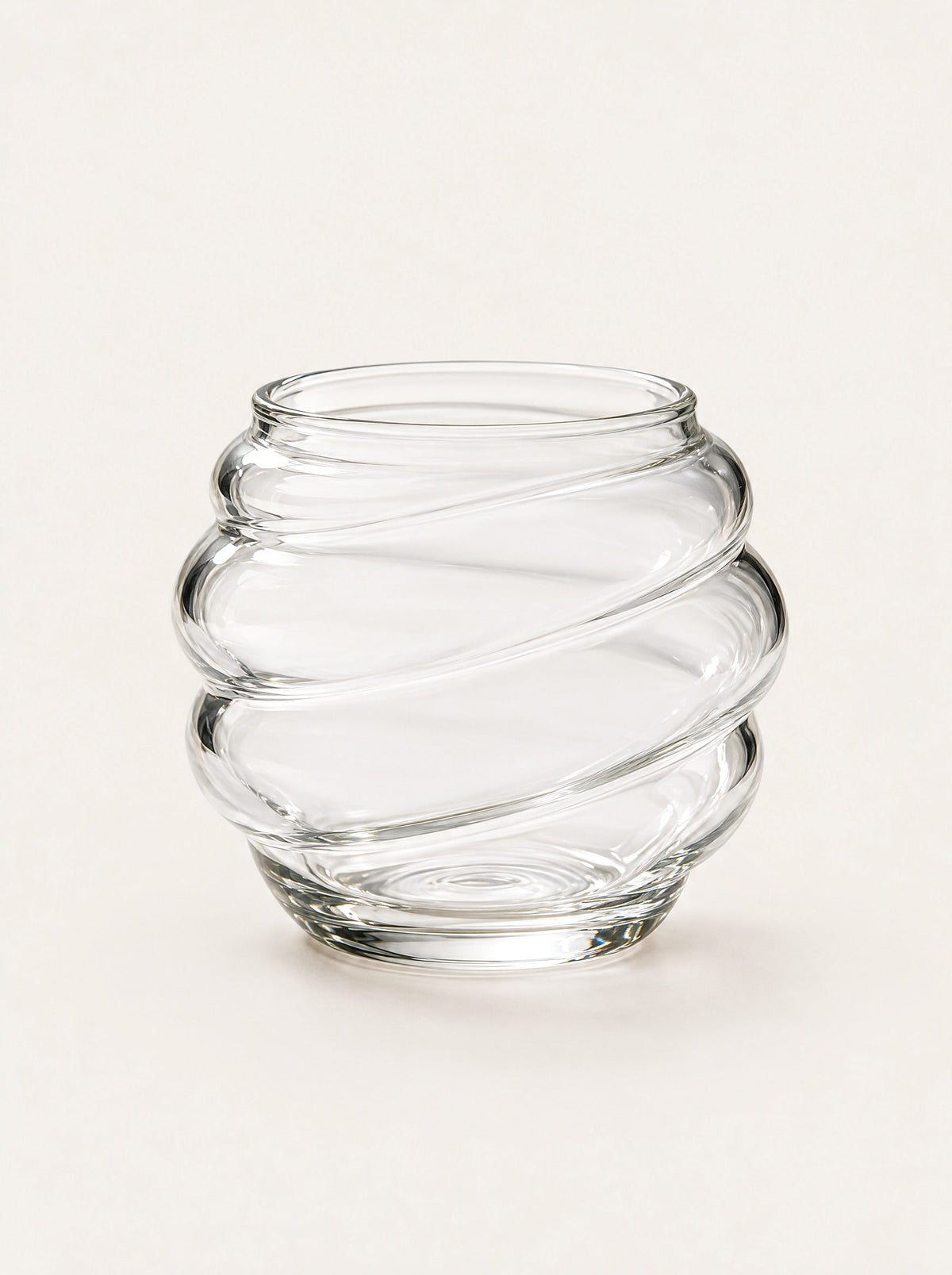 Eddy Ribbed Glass Cup, studio photo on a warm white background