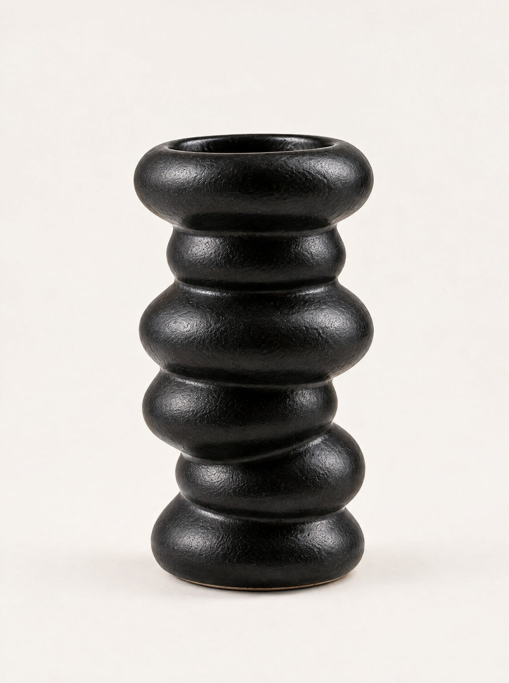 Forma Vase, close-up studio photo on a warm white background