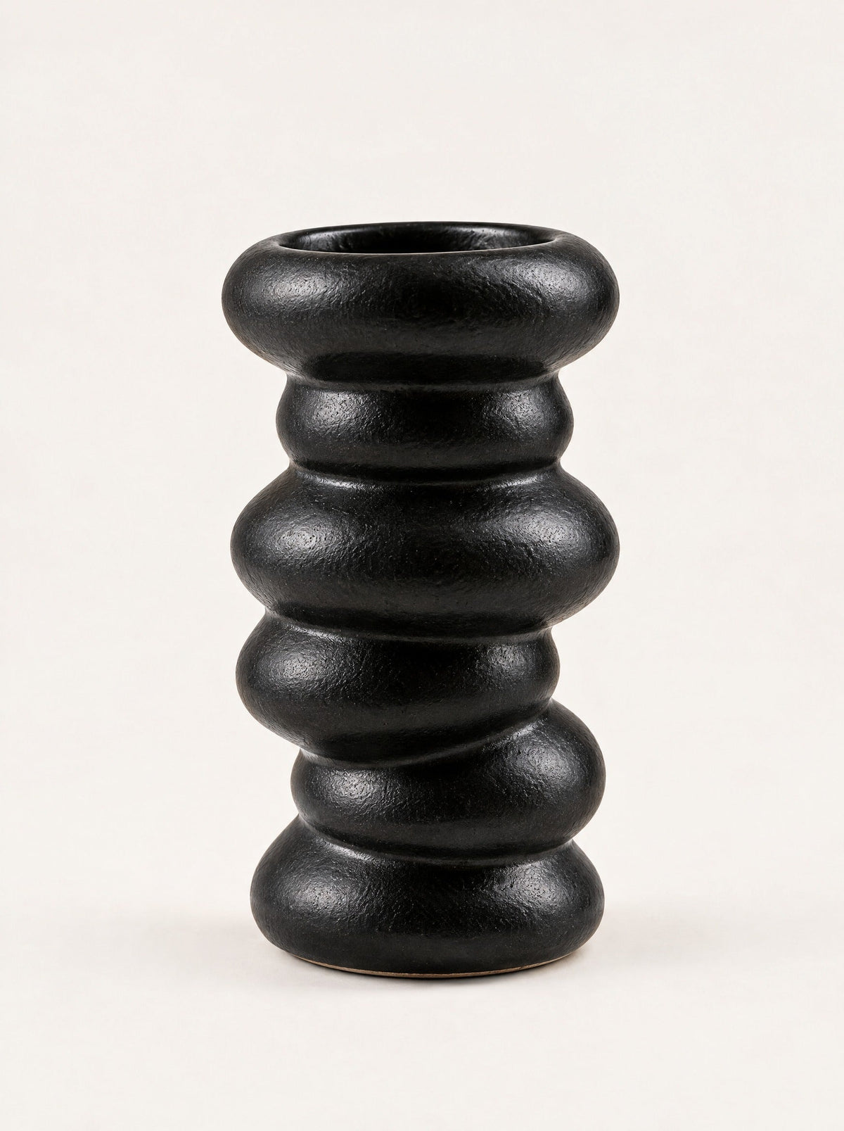 Forma Vase, close-up studio photo on a warm white background