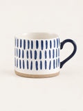 Indigo Hand-Painted Mug, studio photo on a warm white background