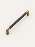 Knurl Brass Door Pull, studio photo on a warm white background