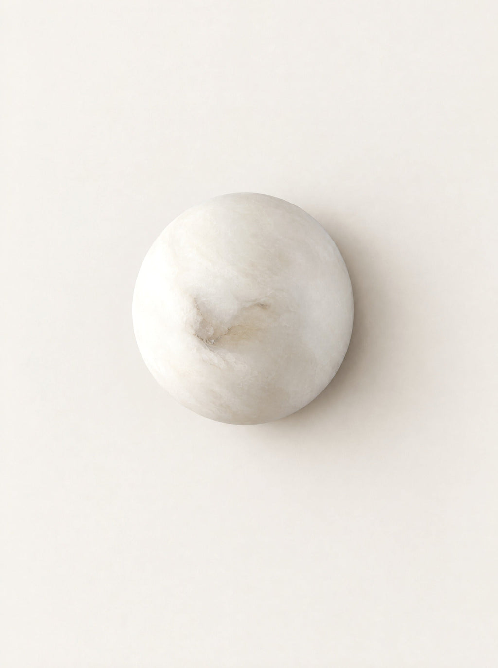 Luna Marble Wall Light, studio photo on a warm white background