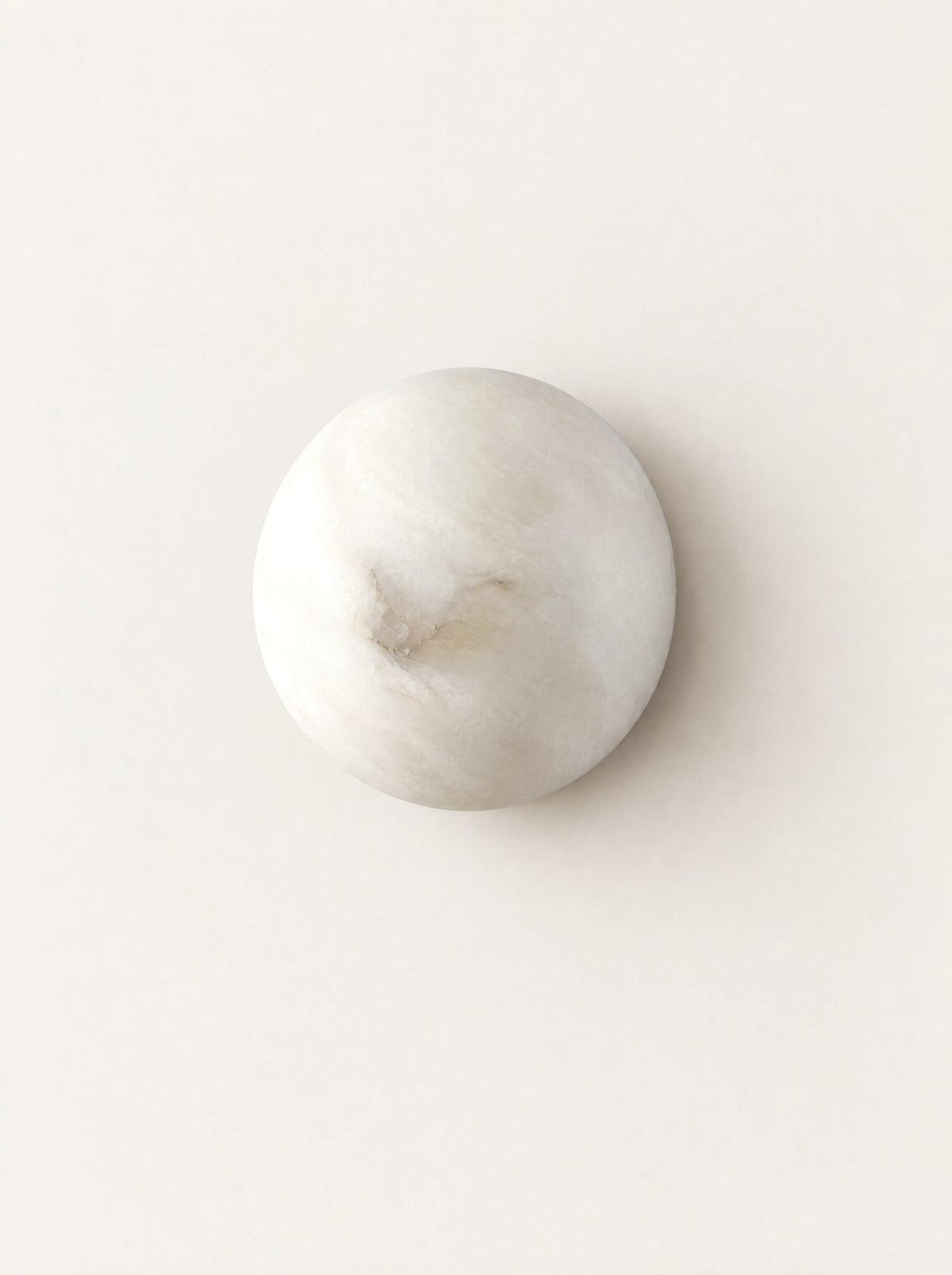 Luna Marble Wall Light, studio photo on a warm white background