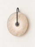 Moonstone Marble Sconce, studio photo on a warm white background