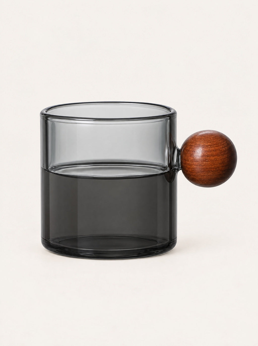 Pinna Tinted Glass Cup, studio photo on a warm white background