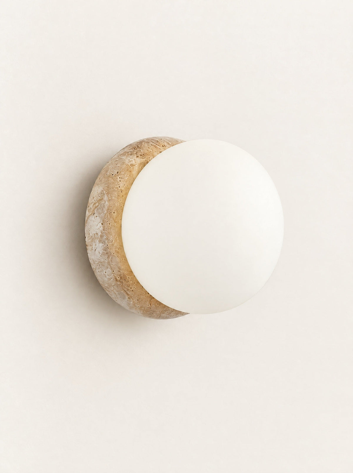 Porthole Stone & Glass Wall Light, studio photo on a warm white background