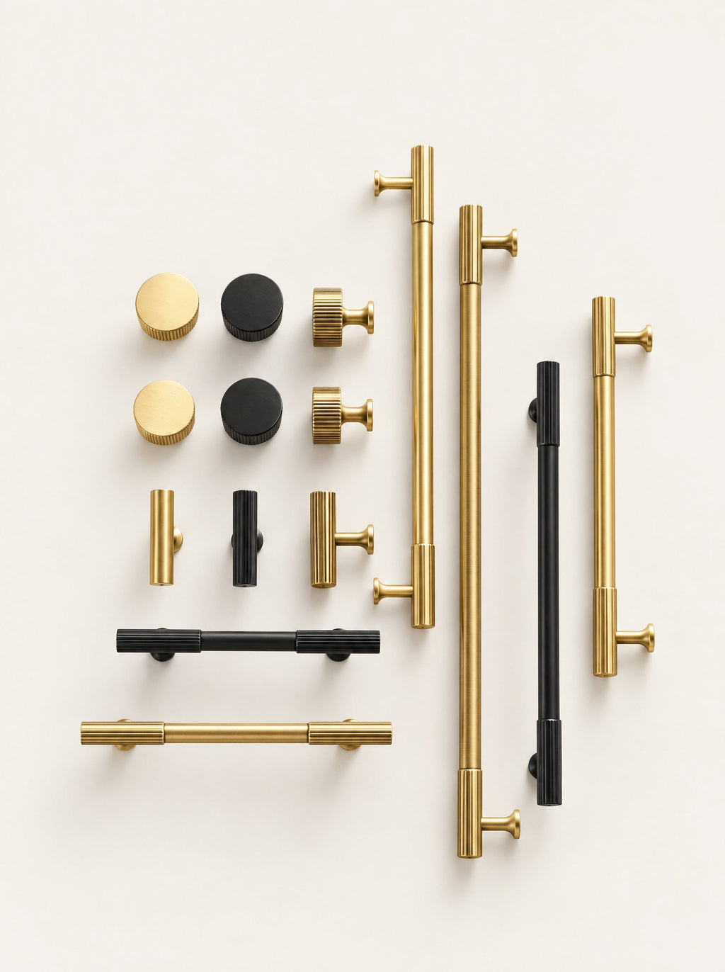 Rib Brass Knob & Pull Collection, studio photo on a warm white background