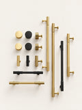 Rib Brass Knob & Pull Collection, studio photo on a warm white background