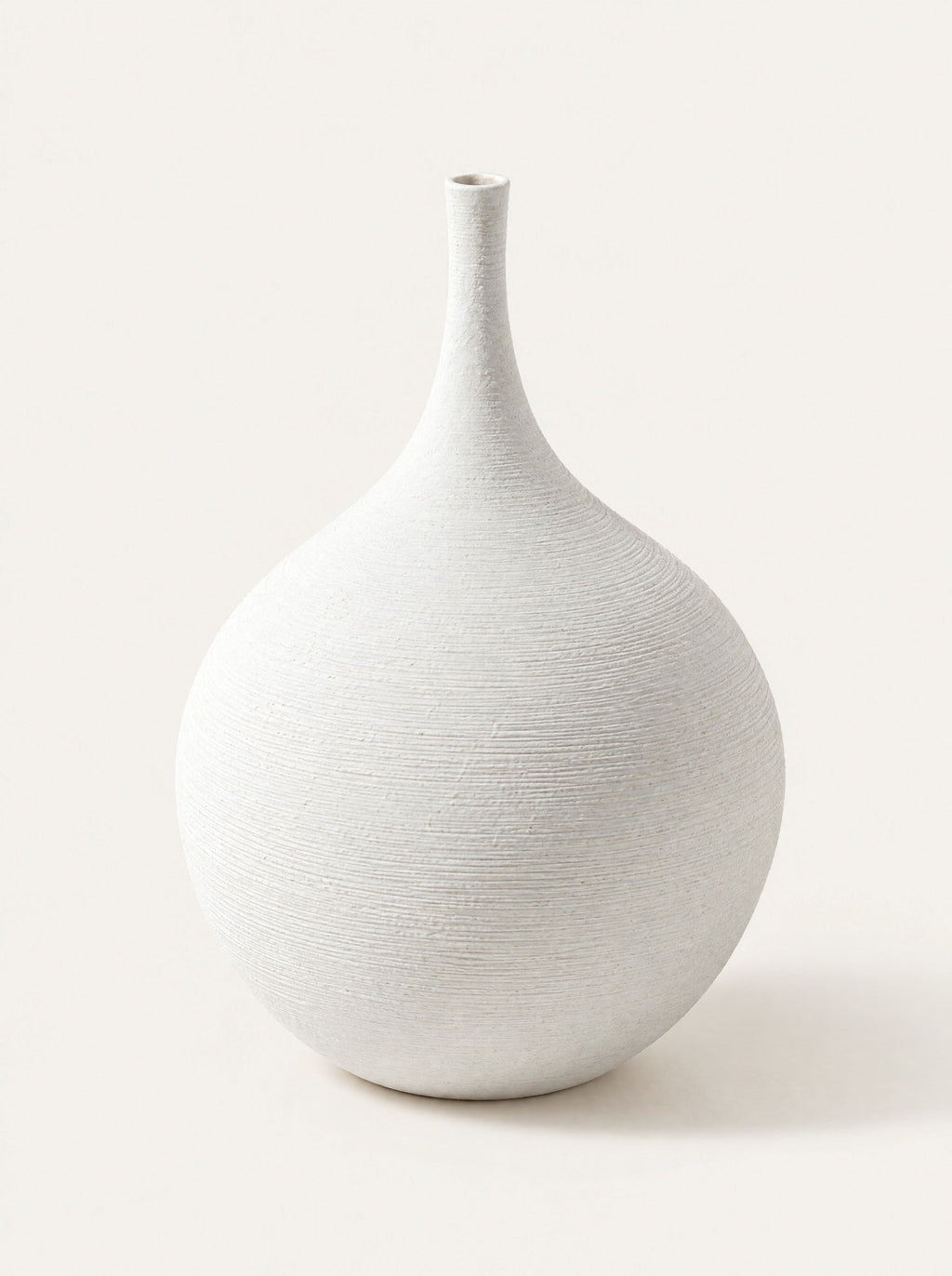 Silhouette Ceramic Bud Vase, close-up studio photo on a warm white background