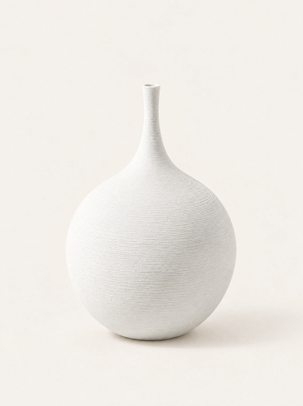 Silhouette Ceramic Bud Vase, studio photo on a warm white background