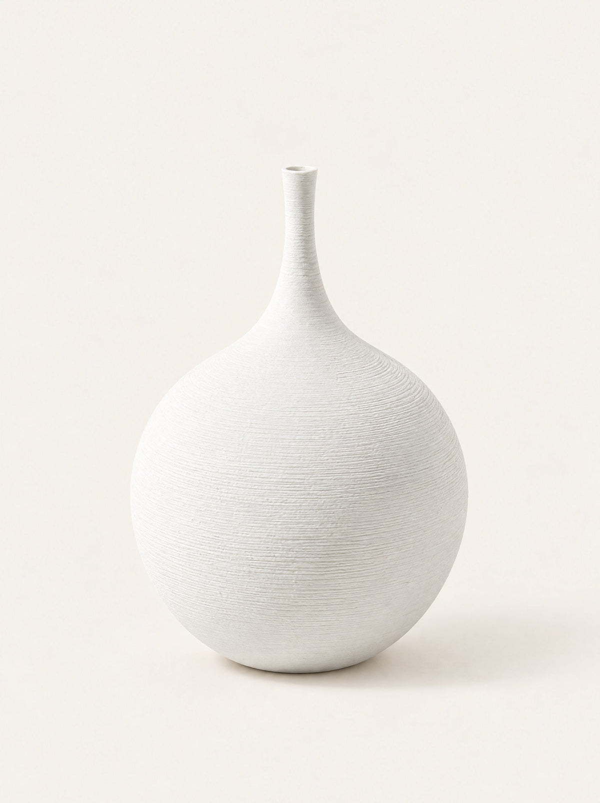 Silhouette Ceramic Bud Vase, studio photo on a warm white background