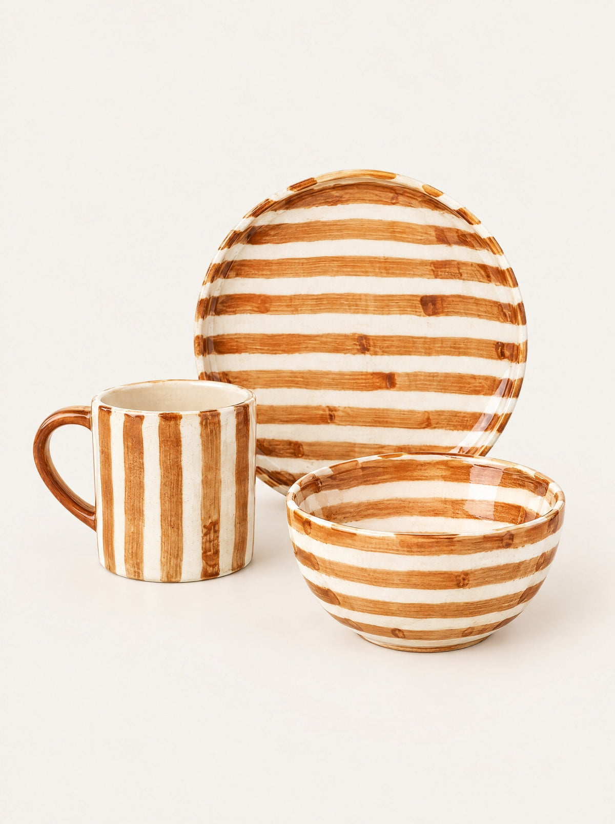 Sol Striped Breakfast Set, close-up studio photo on a warm white background