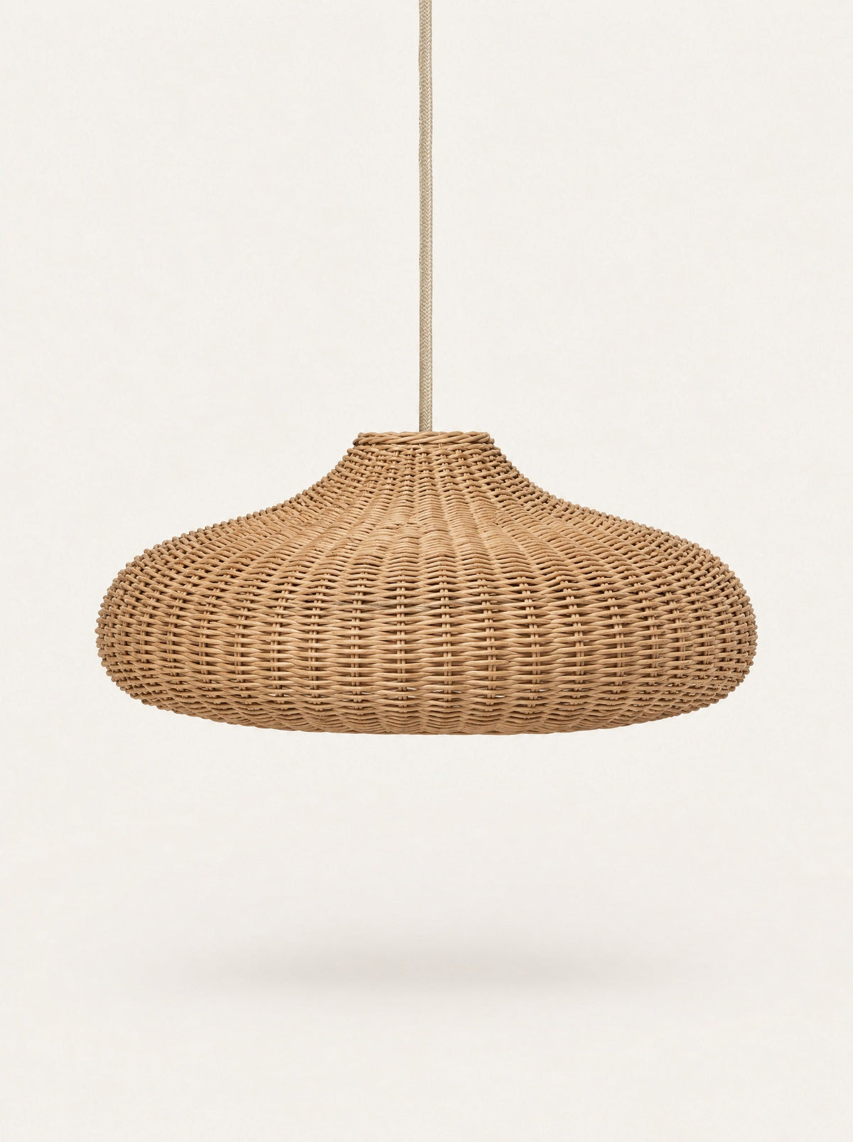 Weave Rattan Pendant, studio photo on a warm white background